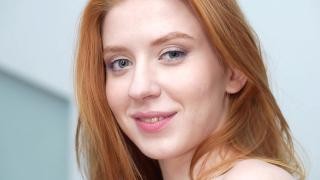 A guy fucks a red-haired slut in the ass