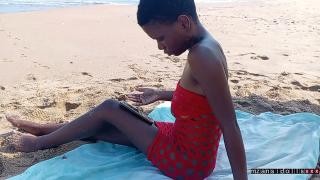 An African man fucks a young African woman hard on the ocean shore.