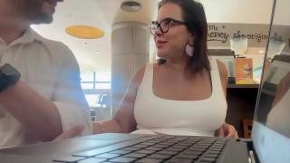 A busty mommy chats with a man at work.