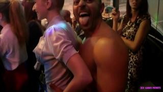 Cheerful women enjoy the company of strippers