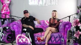 Blonde masturbates on the couch