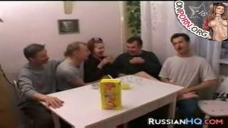 A crowd of guys gave a redhead a hot group sex