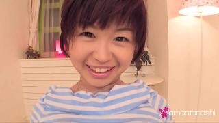 A young Japanese woman shows off her breasts.