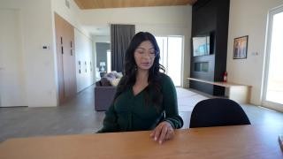 A mature mommy sits at the table and waits for sex with her loved one.