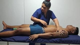 A mature brunette gives a blowjob to a man