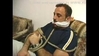 A man raped his wife in front of her tied up husband.