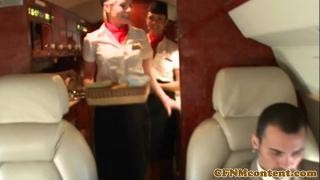 Sexy flight attendants in stockings attack a passenger on a plane.